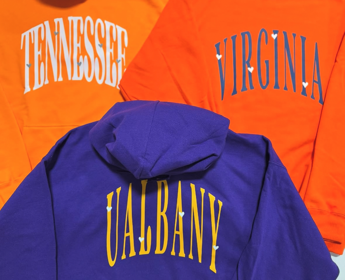 Tennessee, Virginia and UAlbany college hoodies with heart accents on the letters